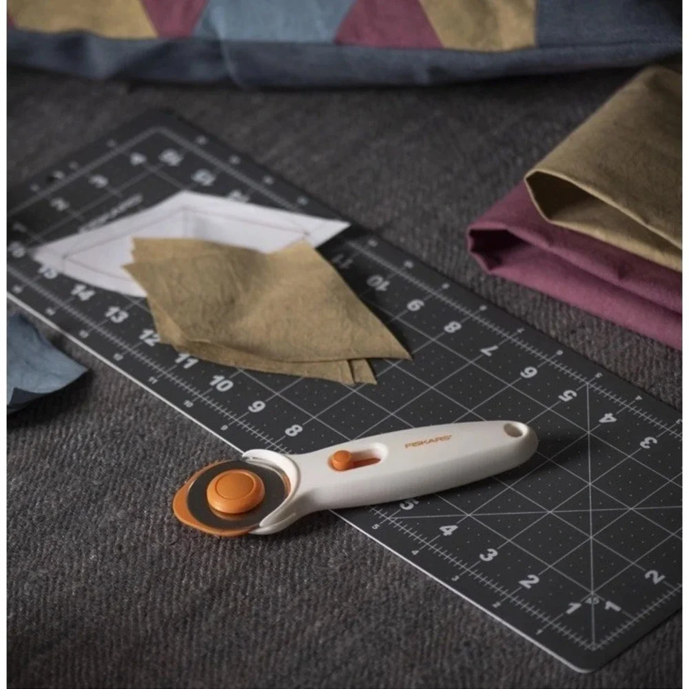 Fiskars 45mm Stick Rotary Cutter for Fabric, Premium Steel Fabric Cutter Cuts